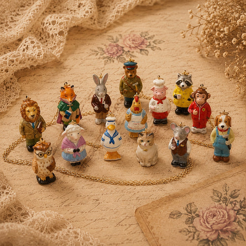 Animal Forest character charms in colorful storybook outfits arranged together on lace.